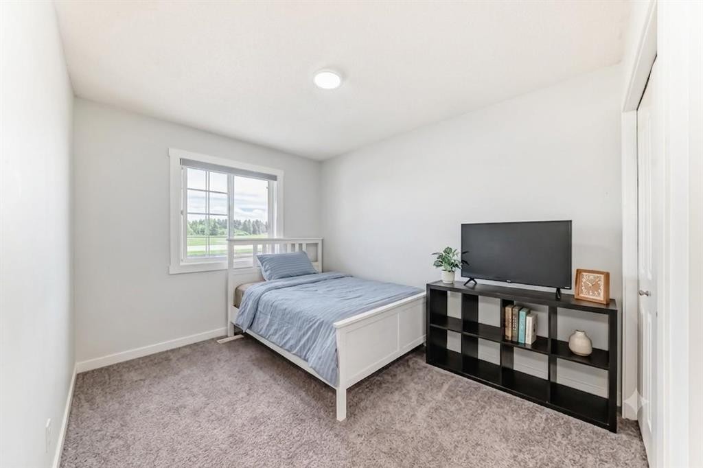 382 Cove Road, Chestermere, AB - Indoor Photo Showing Bedroom