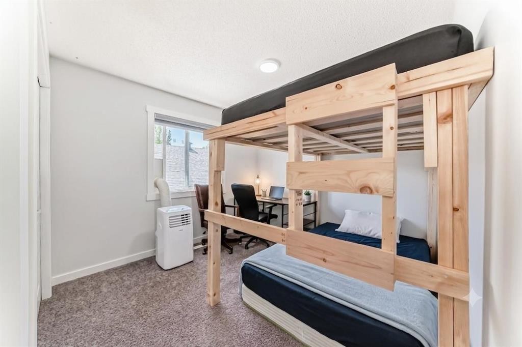 382 Cove Road, Chestermere, AB - Indoor Photo Showing Bedroom