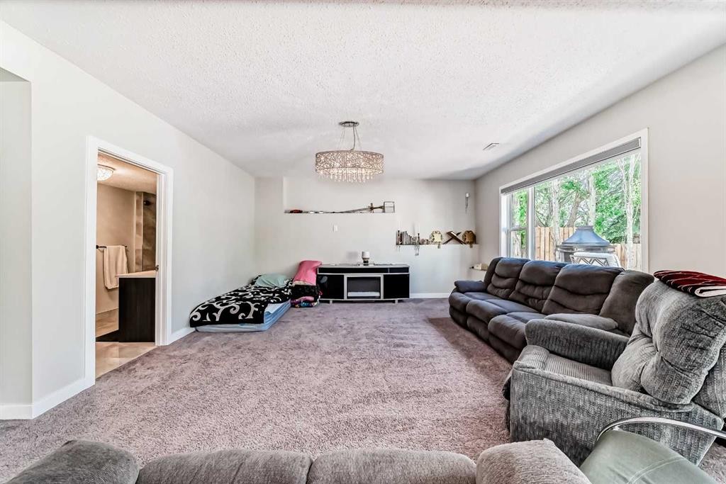 382 Cove Road, Chestermere, AB - Indoor Photo Showing Living Room