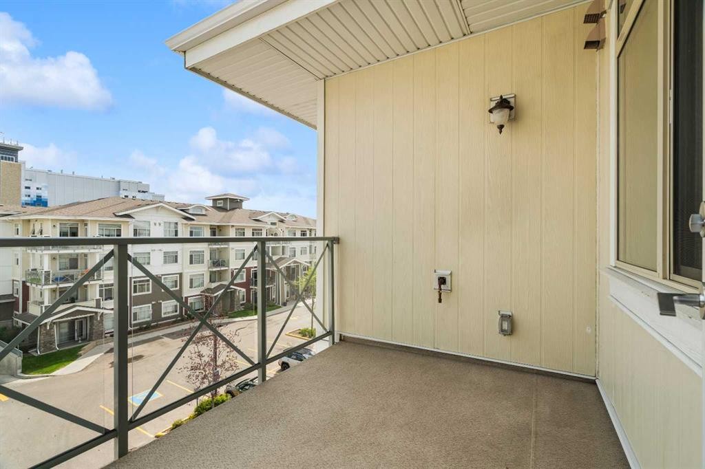 411-28 Auburn Bay Link Se, Calgary, AB - Outdoor With Balcony With Exterior