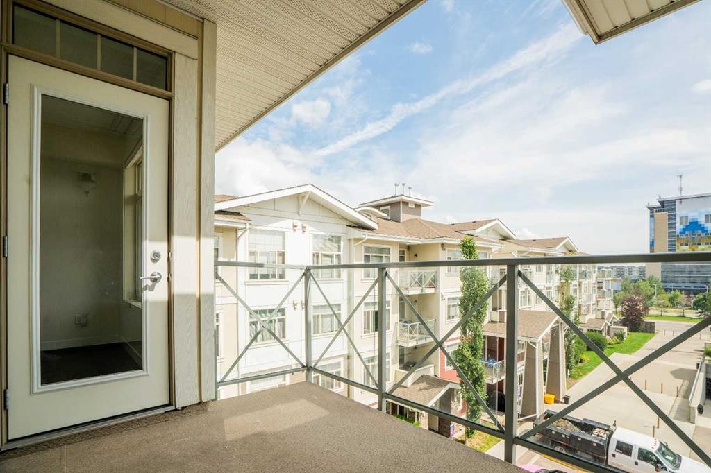 411-28 Auburn Bay Link Se, Calgary, AB - Outdoor With Balcony With Exterior