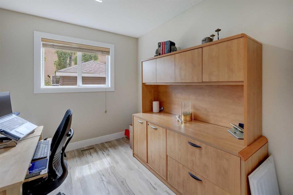 8 Canoe Road Sw, Airdrie, AB - Indoor Photo Showing Office