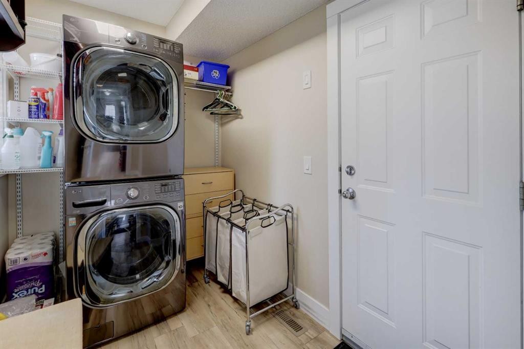 8 Canoe Road Sw, Airdrie, AB - Indoor Photo Showing Laundry Room