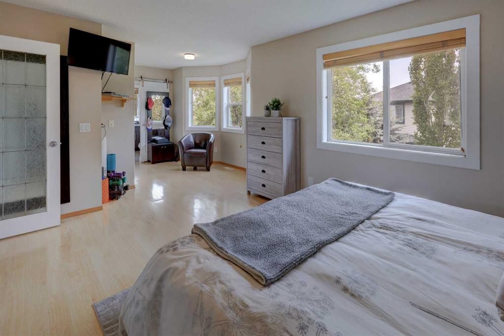 8 Canoe Road Sw, Airdrie, AB - Indoor Photo Showing Bedroom