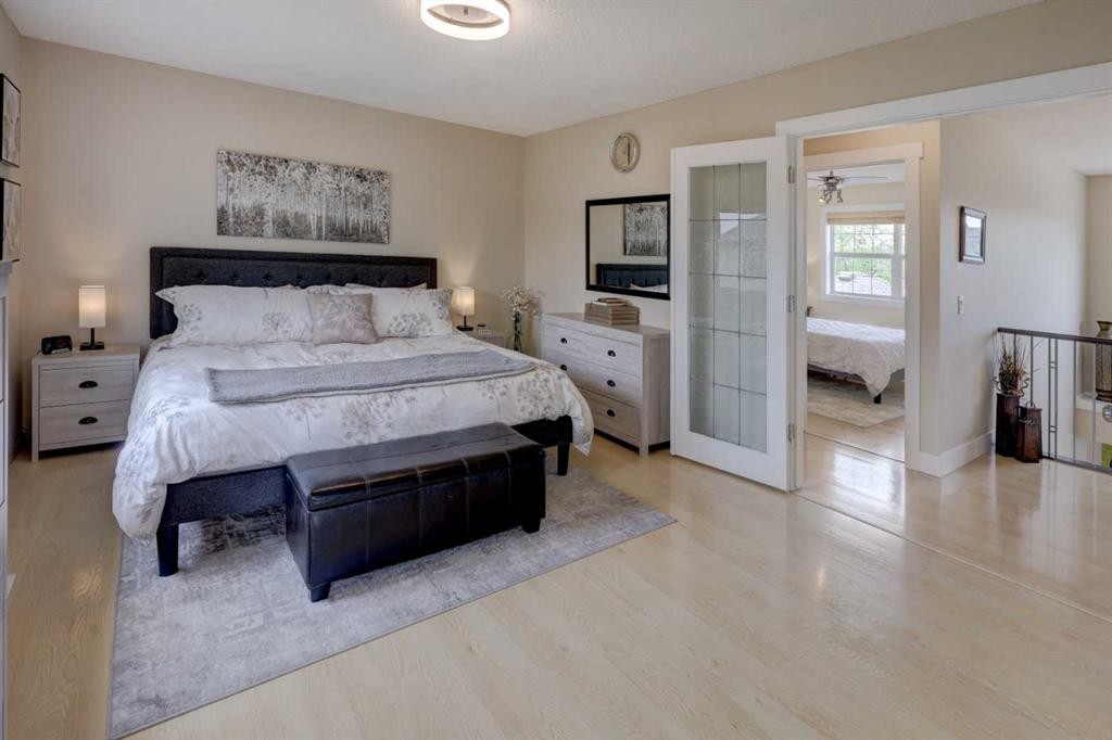 8 Canoe Road Sw, Airdrie, AB - Indoor Photo Showing Bedroom