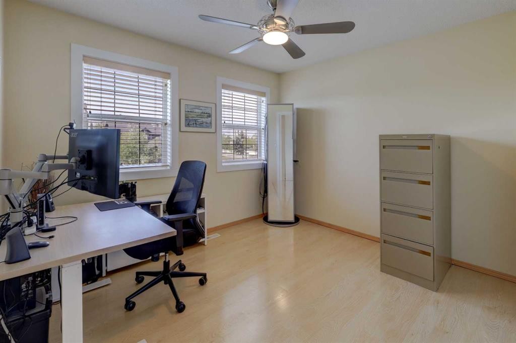 8 Canoe Road Sw, Airdrie, AB - Indoor Photo Showing Office