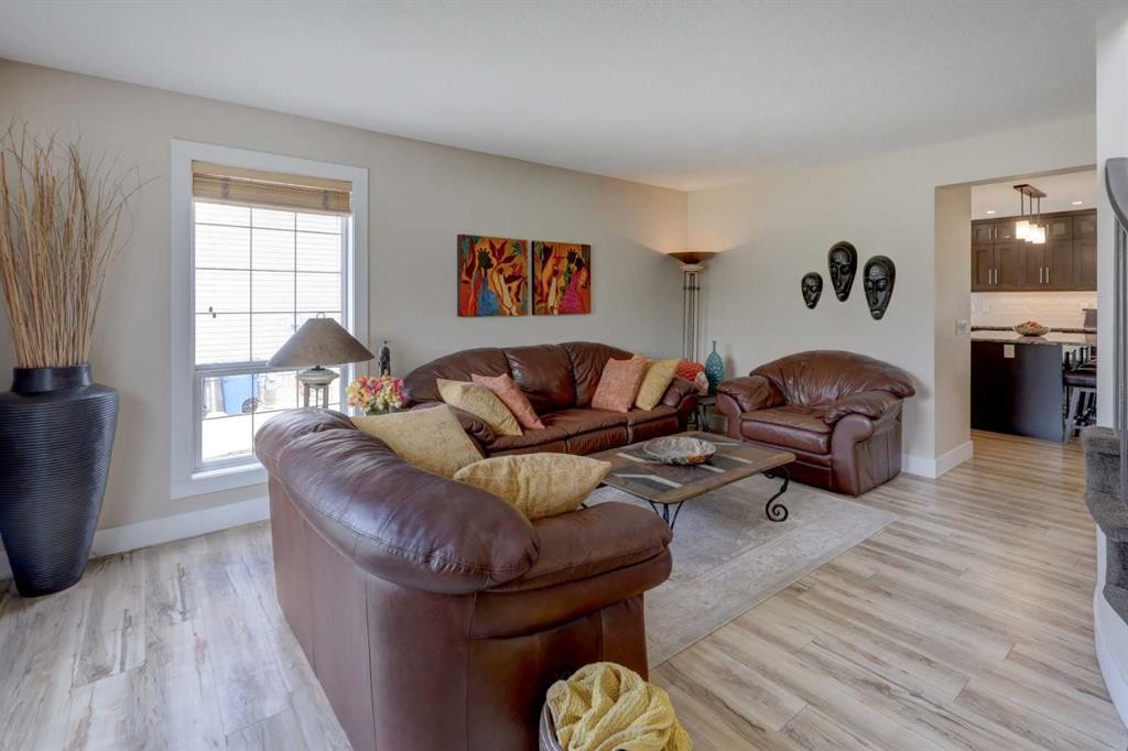8 Canoe Road Sw, Airdrie, AB - Indoor Photo Showing Living Room