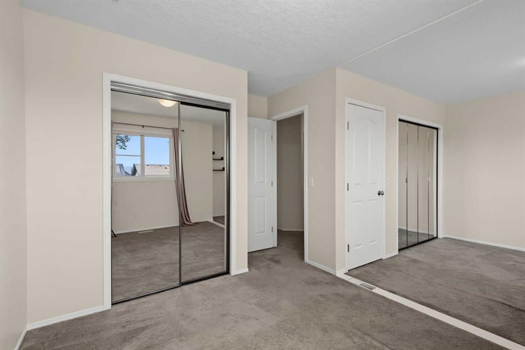 34 Eversyde Common Sw, Calgary, AB - Indoor Photo Showing Other Room