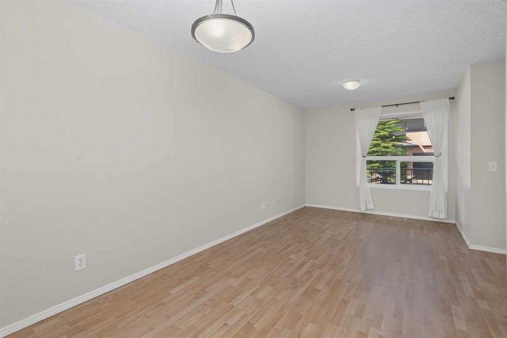 34 Eversyde Common Sw, Calgary, AB - Indoor Photo Showing Other Room