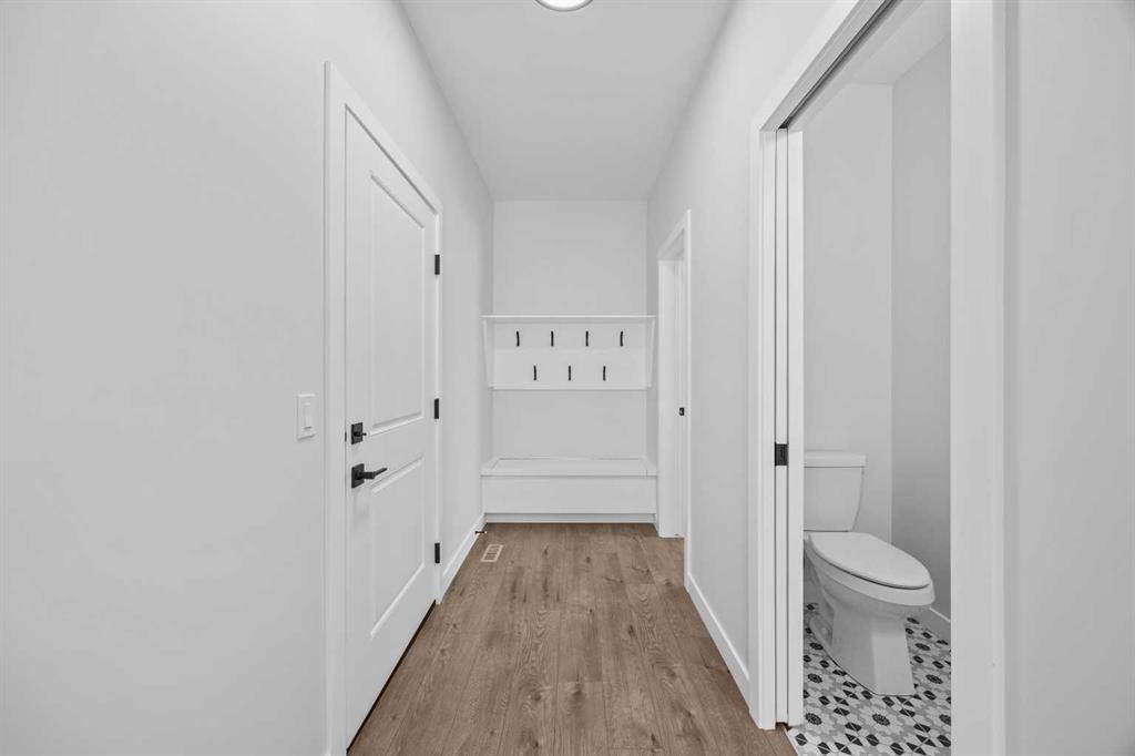 35 Creekside Rise Sw, Calgary, AB - Indoor Photo Showing Other Room