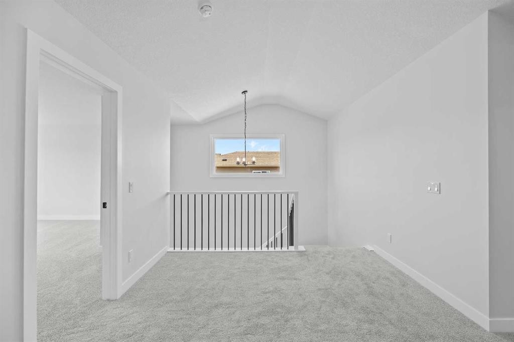 35 Creekside Rise Sw, Calgary, AB - Indoor Photo Showing Other Room