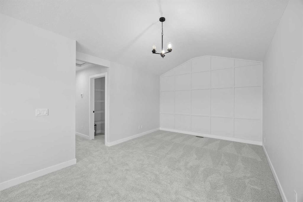 35 Creekside Rise Sw, Calgary, AB - Indoor Photo Showing Other Room