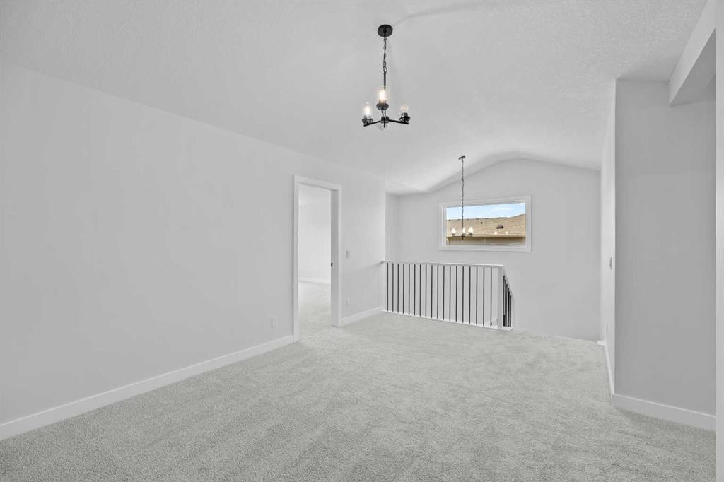 35 Creekside Rise Sw, Calgary, AB - Indoor Photo Showing Other Room
