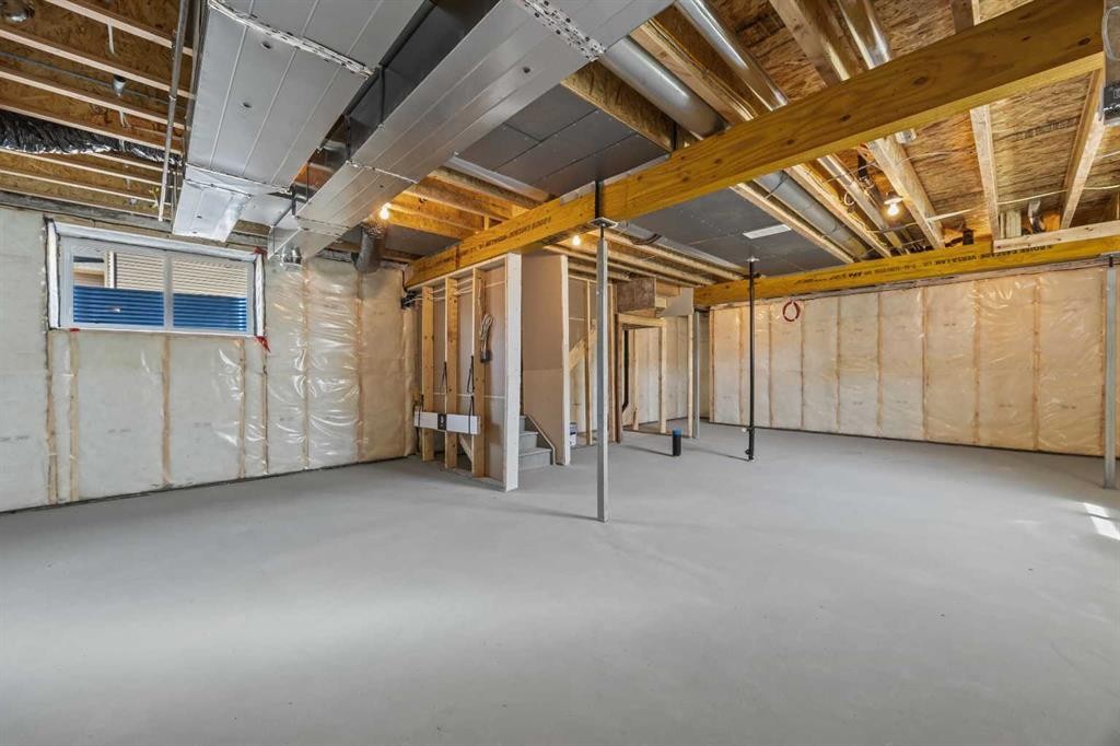 35 Creekside Rise Sw, Calgary, AB - Indoor Photo Showing Basement