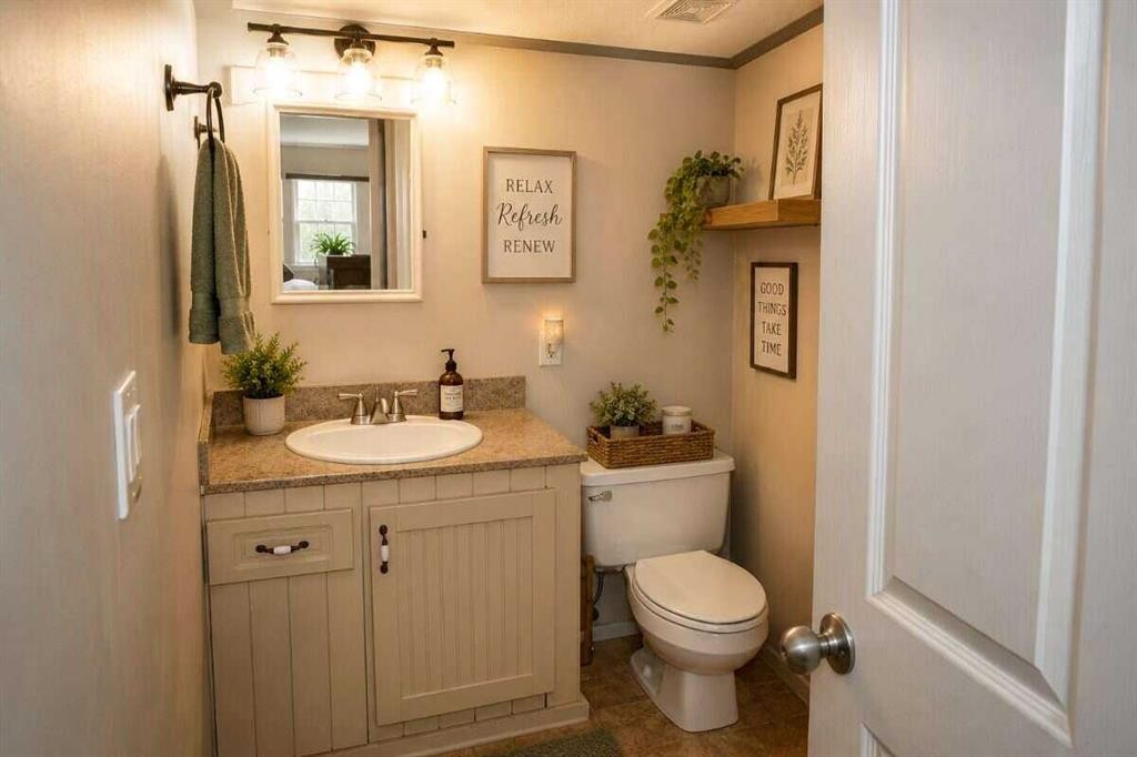 145-37411 Waskasoo Avenue, Rural Red Deer County, AB - Indoor Photo Showing Bathroom