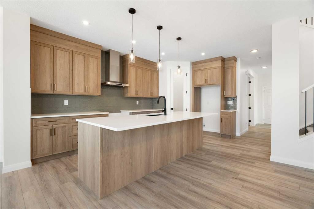 331 Rivercrest Road, Cochrane, AB - Indoor Photo Showing Kitchen With Upgraded Kitchen