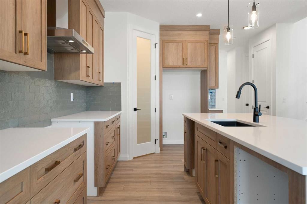 331 Rivercrest Road, Cochrane, AB - Indoor Photo Showing Kitchen With Upgraded Kitchen