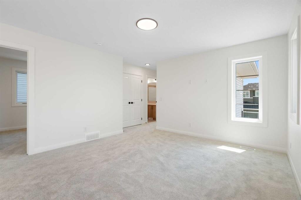 331 Rivercrest Road, Cochrane, AB - Indoor Photo Showing Other Room