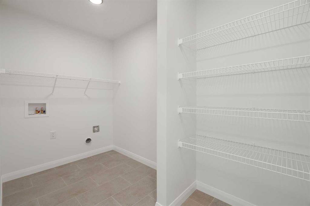 331 Rivercrest Road, Cochrane, AB - Indoor With Storage