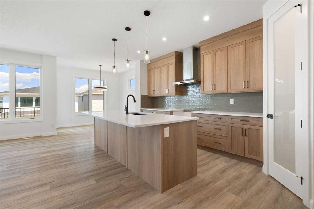 331 Rivercrest Road, Cochrane, AB - Indoor Photo Showing Kitchen With Upgraded Kitchen