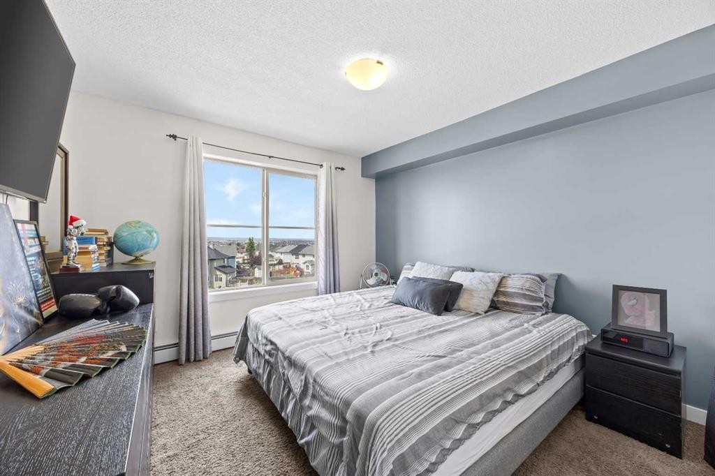 401-7110 80 Avenue Ne, Calgary, AB - Indoor Photo Showing Bedroom