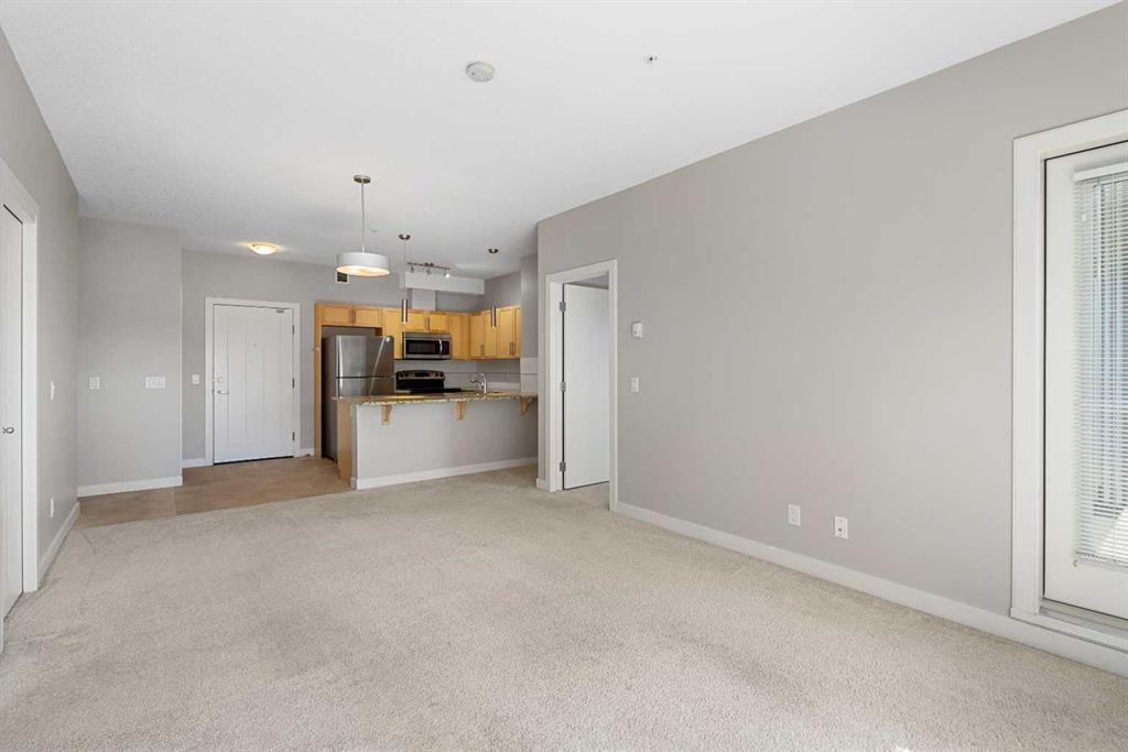 2307-604 East Lake Boulevard Ne, Airdrie, AB - Indoor Photo Showing Other Room