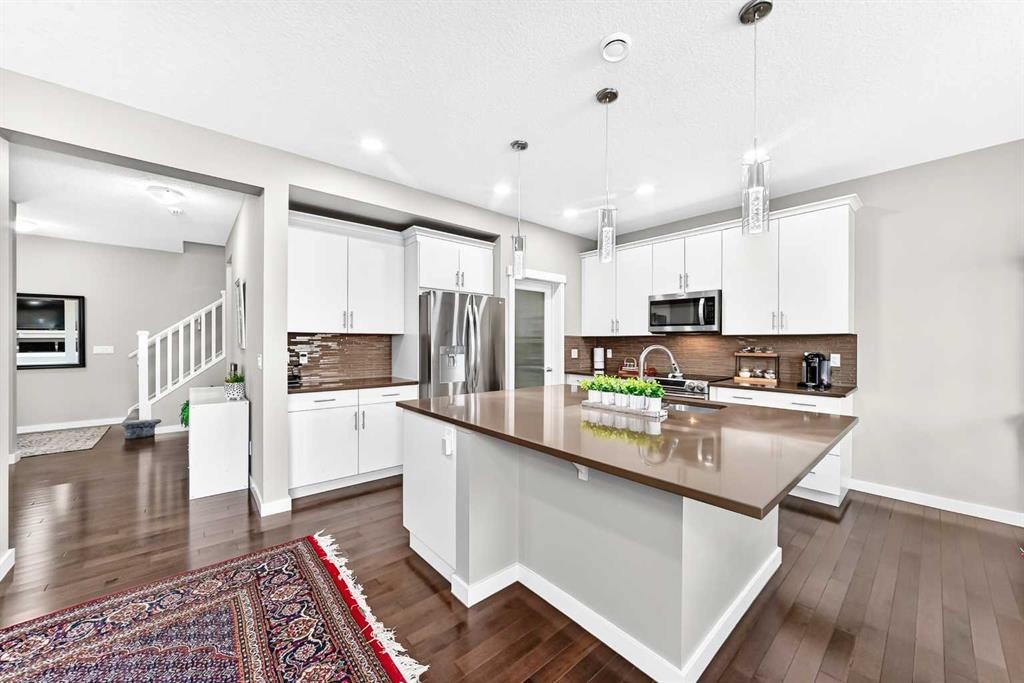 56 Evansborough Green Nw, Calgary, AB - Indoor Photo Showing Kitchen With Stainless Steel Kitchen With Upgraded Kitchen