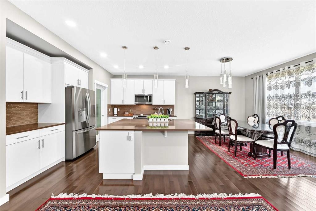 56 Evansborough Green Nw, Calgary, AB - Indoor Photo Showing Kitchen With Stainless Steel Kitchen With Upgraded Kitchen