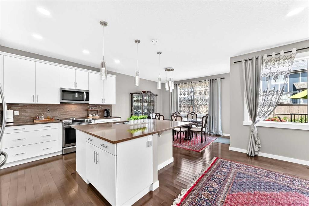 56 Evansborough Green Nw, Calgary, AB - Indoor Photo Showing Kitchen With Upgraded Kitchen