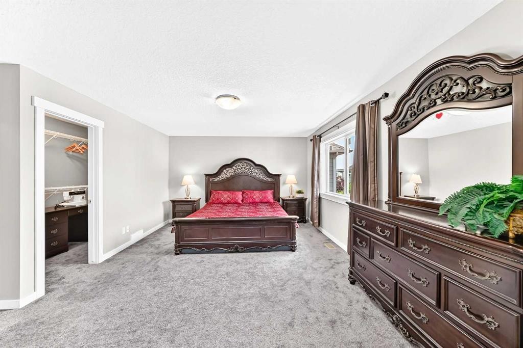 56 Evansborough Green Nw, Calgary, AB - Indoor Photo Showing Bedroom