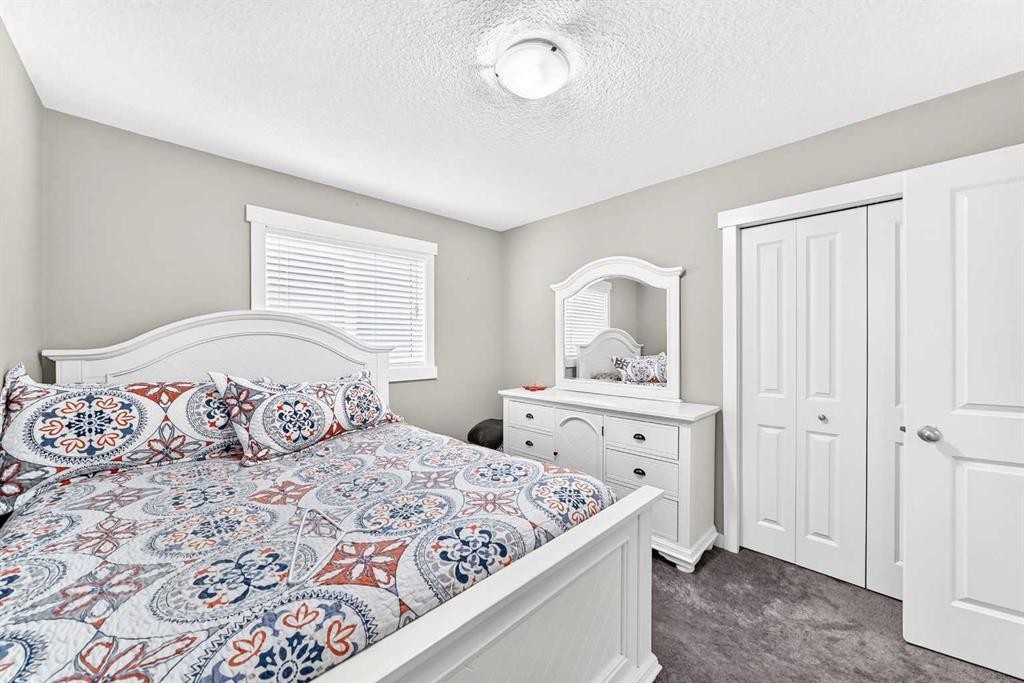 56 Evansborough Green Nw, Calgary, AB - Indoor Photo Showing Bedroom