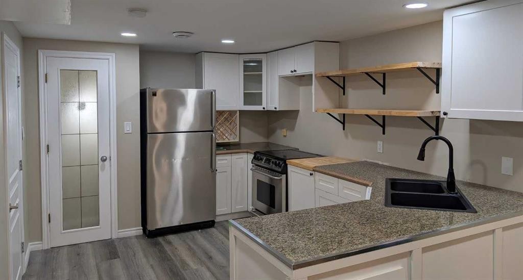 2614 44 Street Se, Calgary, AB - Indoor Photo Showing Kitchen With Double Sink