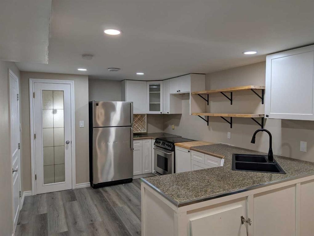 2614 44 Street Se, Calgary, AB - Indoor Photo Showing Kitchen With Double Sink