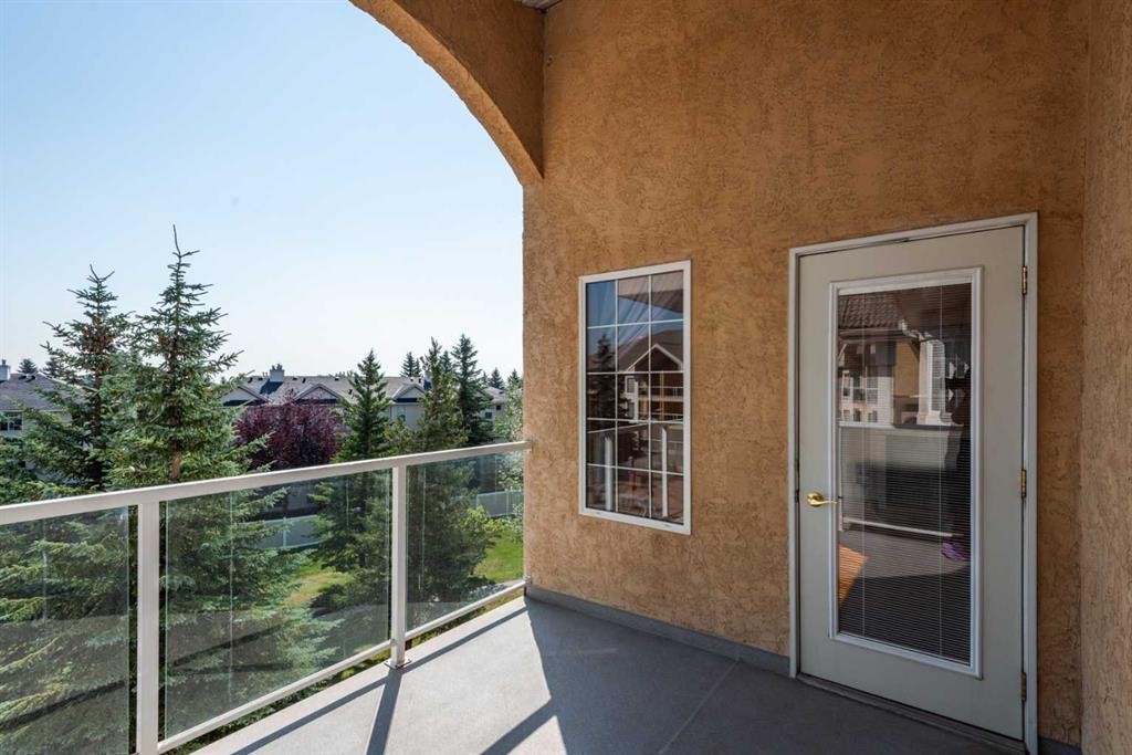 304-728 Country Hills Road Nw, Calgary, AB - Outdoor With Balcony With Exterior