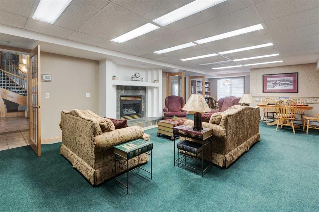304-728 Country Hills Road Nw, Calgary, AB - Indoor With Fireplace