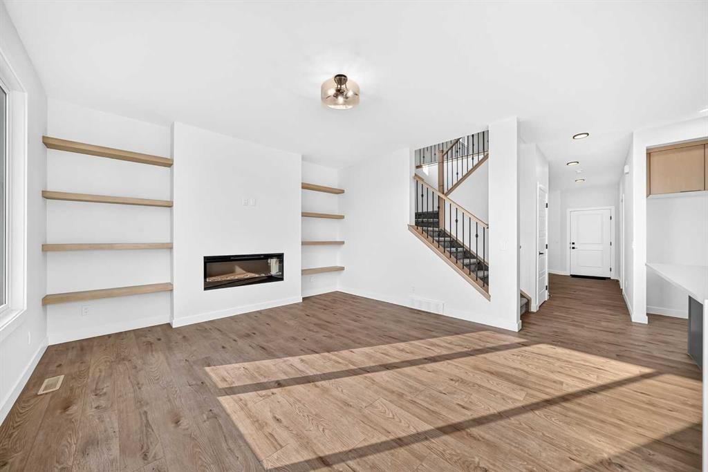 199 Langwell Common Se, Airdrie, AB - Indoor With Fireplace