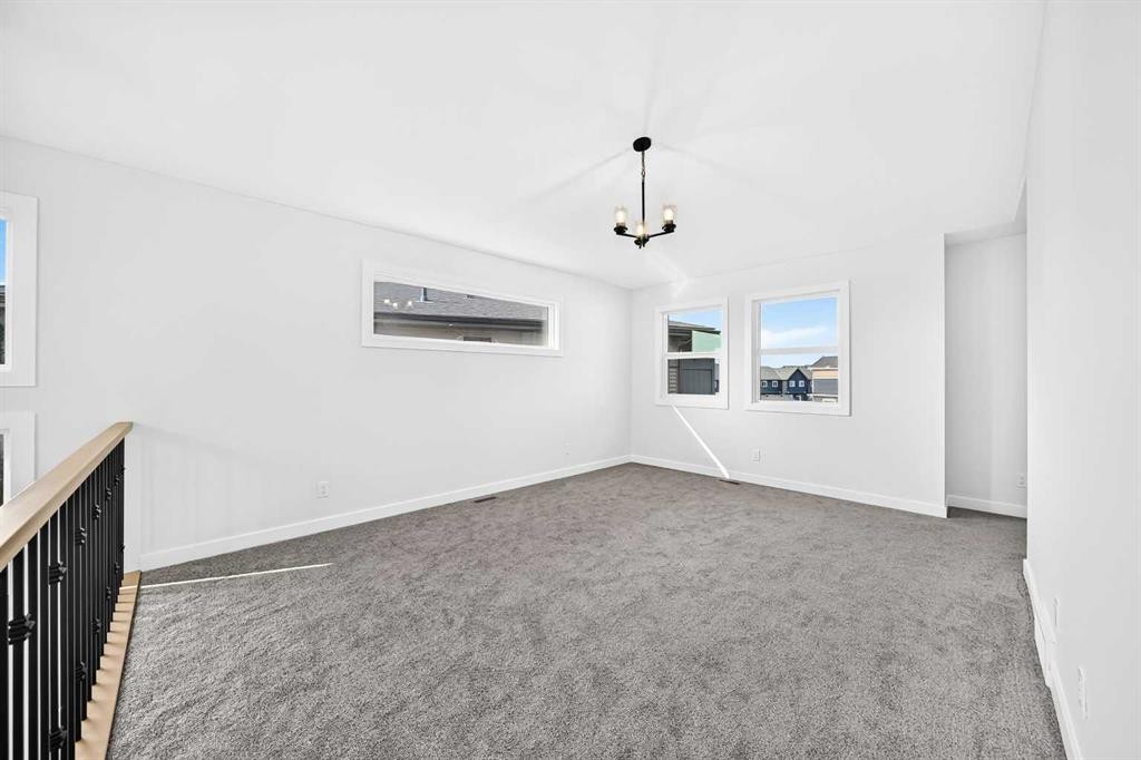 199 Langwell Common Se, Airdrie, AB - Indoor Photo Showing Other Room