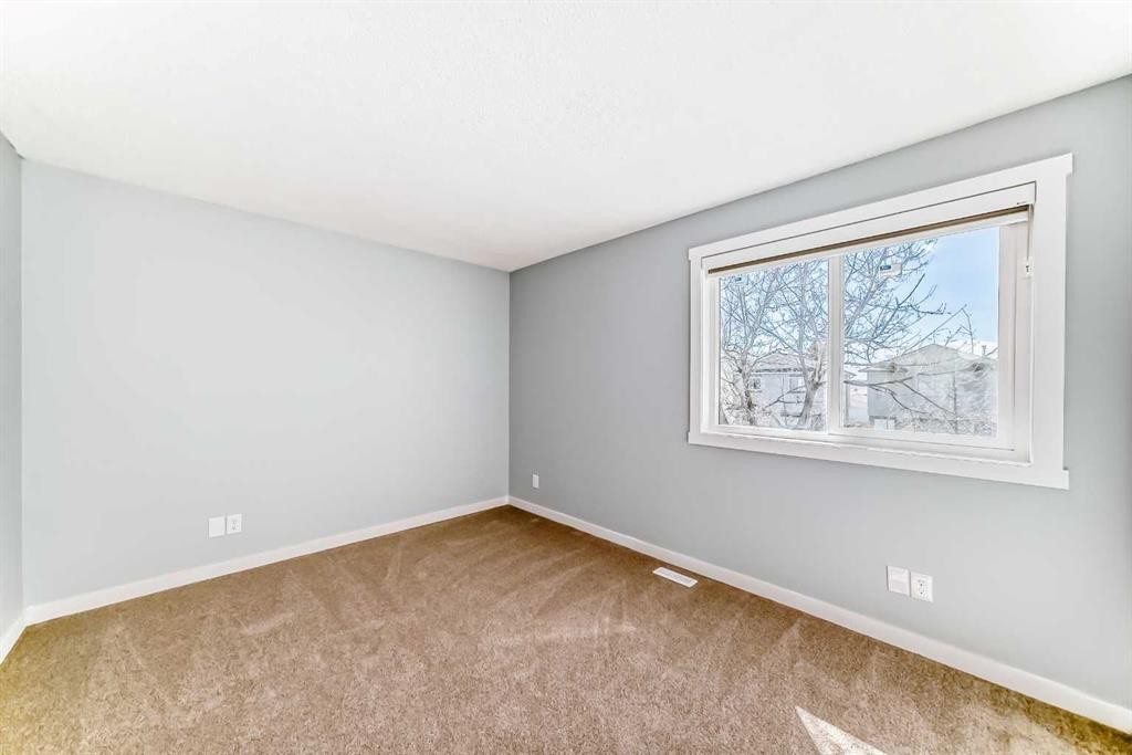 77 Martinbrook Road Ne, Calgary, AB - Indoor Photo Showing Other Room