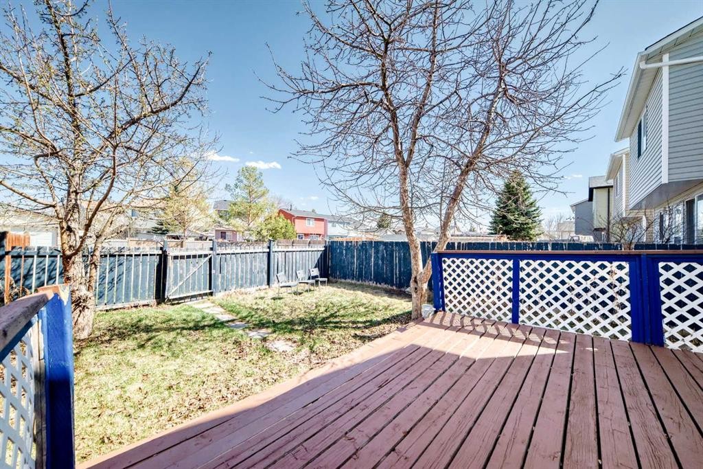 77 Martinbrook Road Ne, Calgary, AB - Outdoor With Deck Patio Veranda