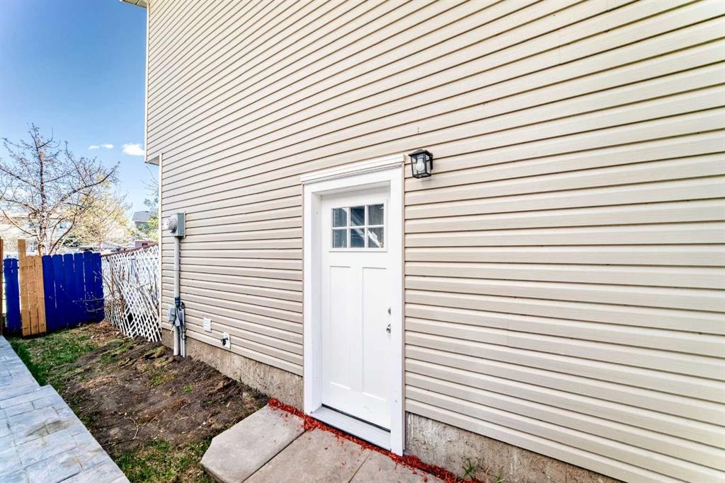 77 Martinbrook Road Ne, Calgary, AB - Outdoor With Exterior