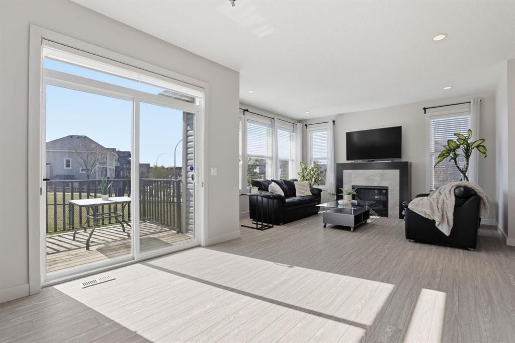 4 Heritage Terrace, Cochrane, AB - Indoor With Fireplace