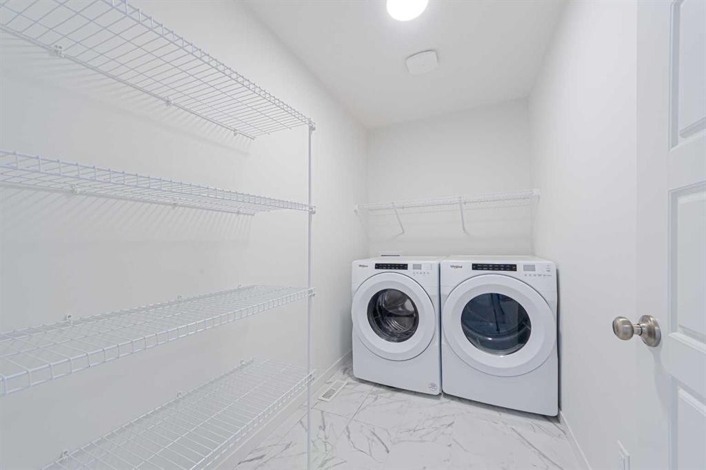186 Aquila Drive Nw, Calgary, AB - Indoor Photo Showing Laundry Room