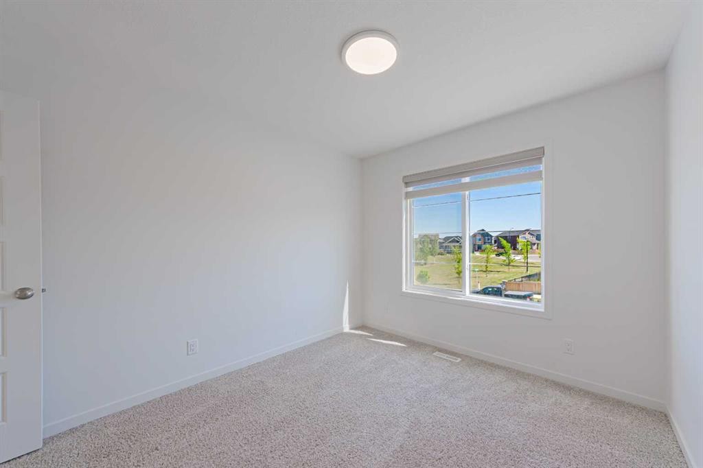 186 Aquila Drive Nw, Calgary, AB - Indoor Photo Showing Other Room