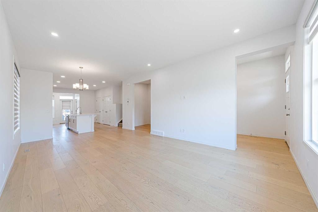 186 Aquila Drive Nw, Calgary, AB - Indoor Photo Showing Other Room