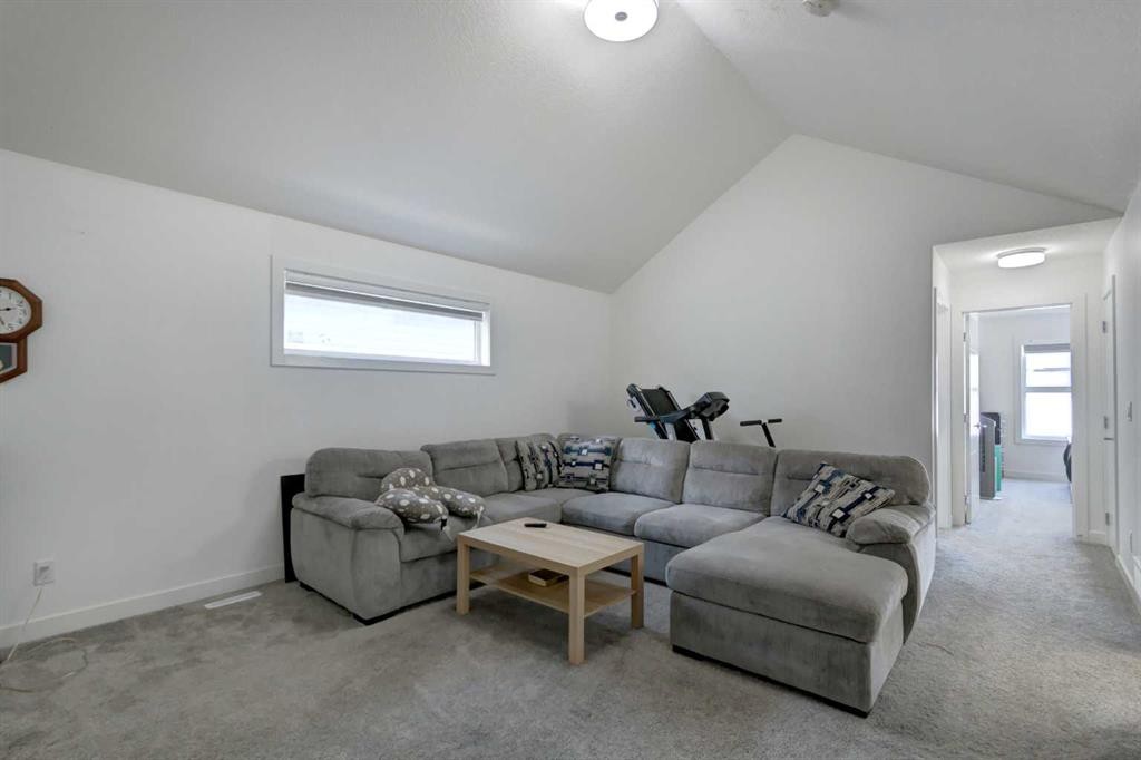 92 Copperhead Grove Se, Calgary, AB - Indoor Photo Showing Living Room