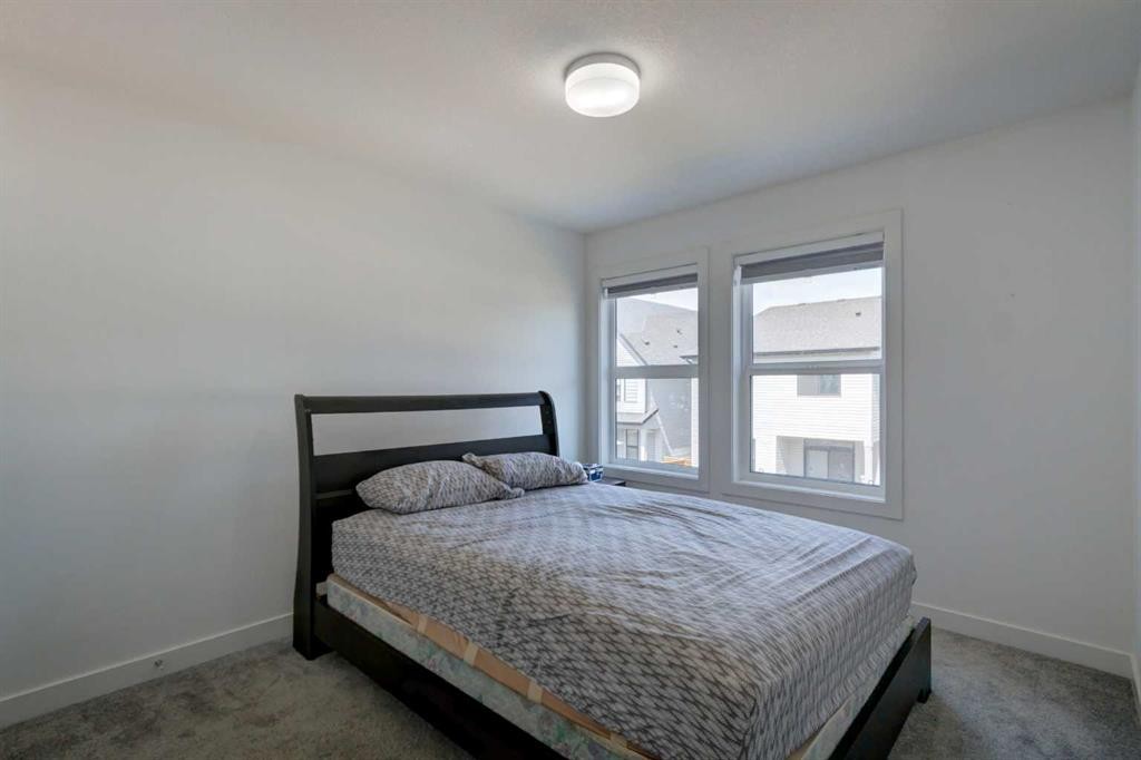 92 Copperhead Grove Se, Calgary, AB - Indoor Photo Showing Bedroom