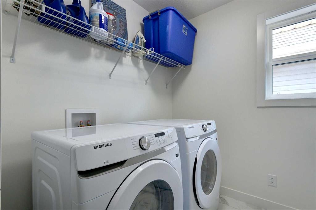 92 Copperhead Grove Se, Calgary, AB - Indoor Photo Showing Laundry Room