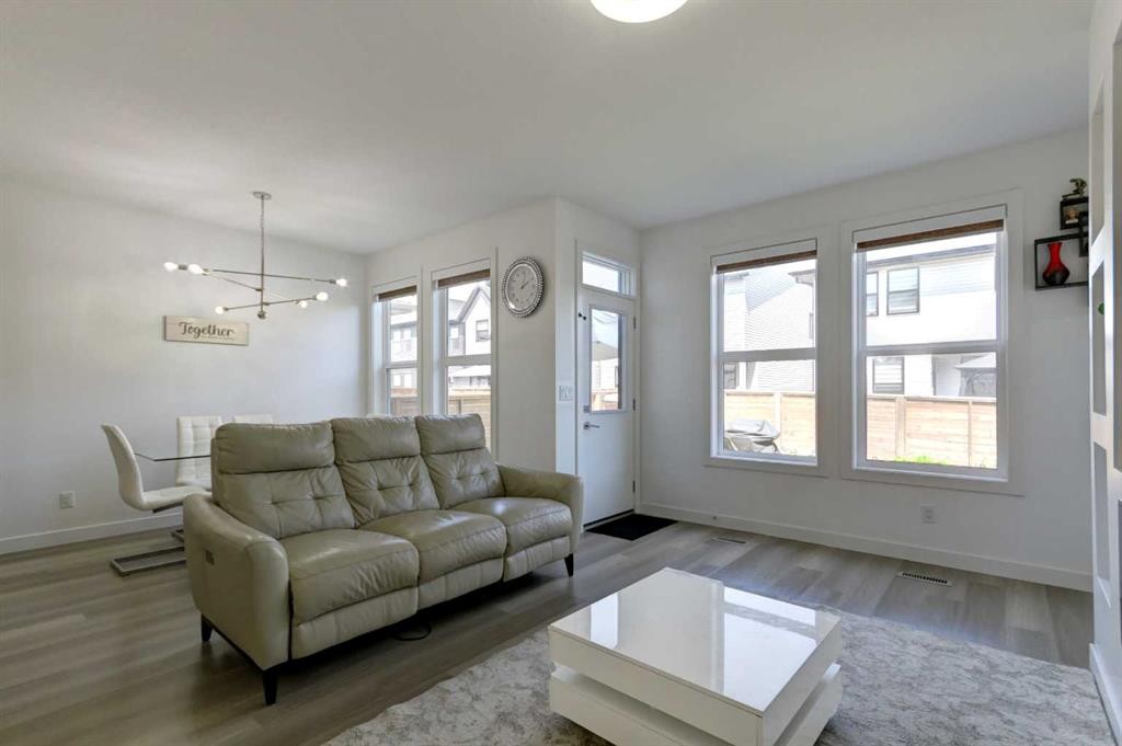 92 Copperhead Grove Se, Calgary, AB - Indoor Photo Showing Living Room
