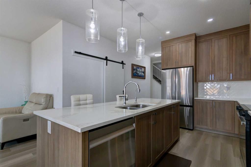 92 Copperhead Grove Se, Calgary, AB - Indoor Photo Showing Kitchen With Stainless Steel Kitchen With Double Sink With Upgraded Kitchen