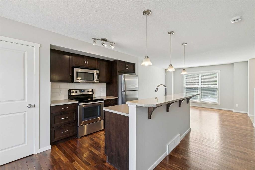 28 Walden Drive Se, Calgary, AB - Indoor Photo Showing Kitchen With Upgraded Kitchen